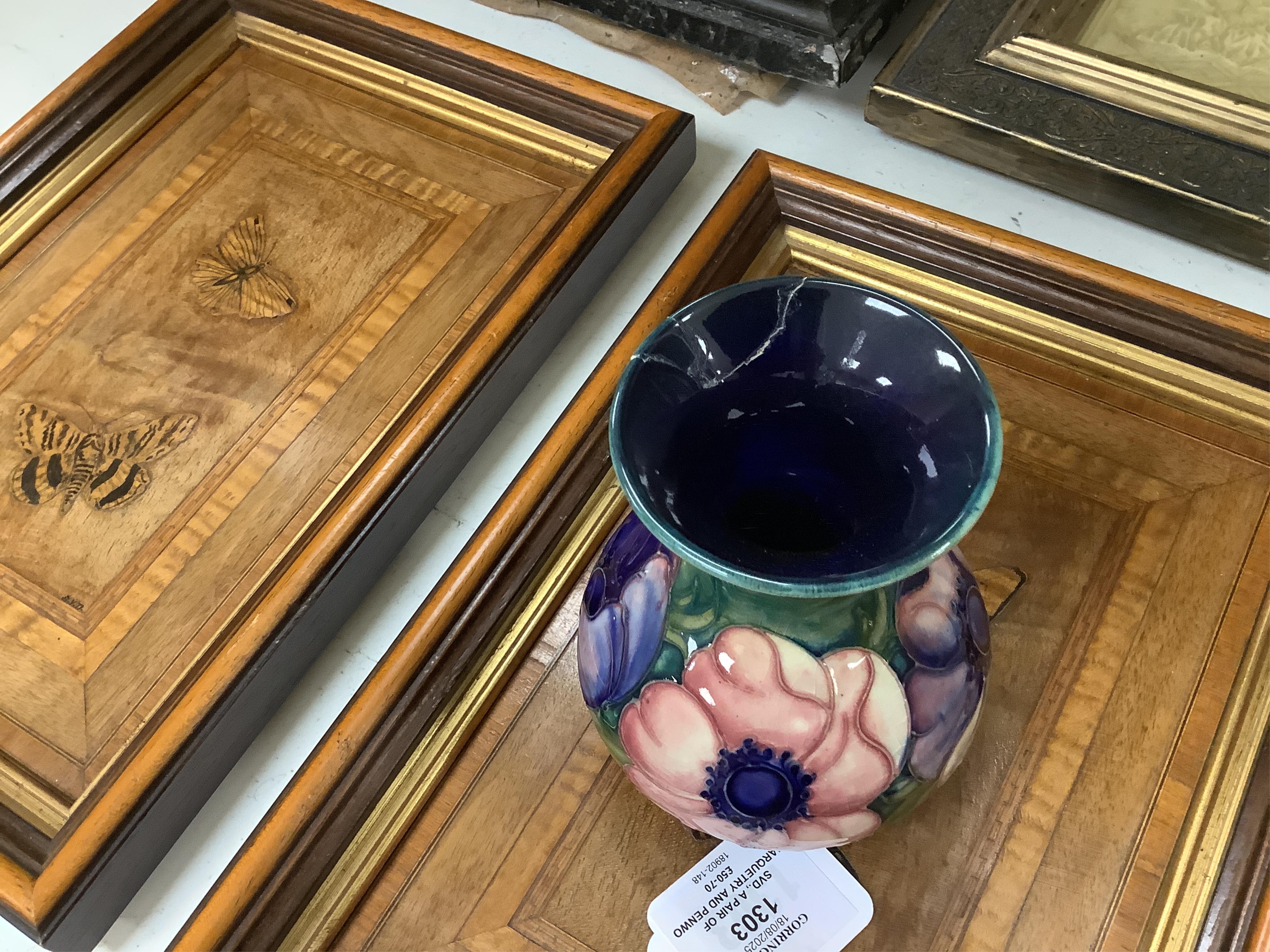 A collection of modern Moorcroft to include a mountain gold pattern vase, two pin dishes and a Hibiscus pattern candlestick, largest 20cm high